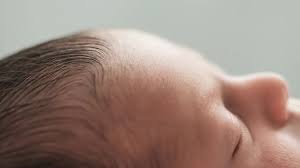 Budding Beauty: Styling Tips for Your Baby's First Wisps of Hair