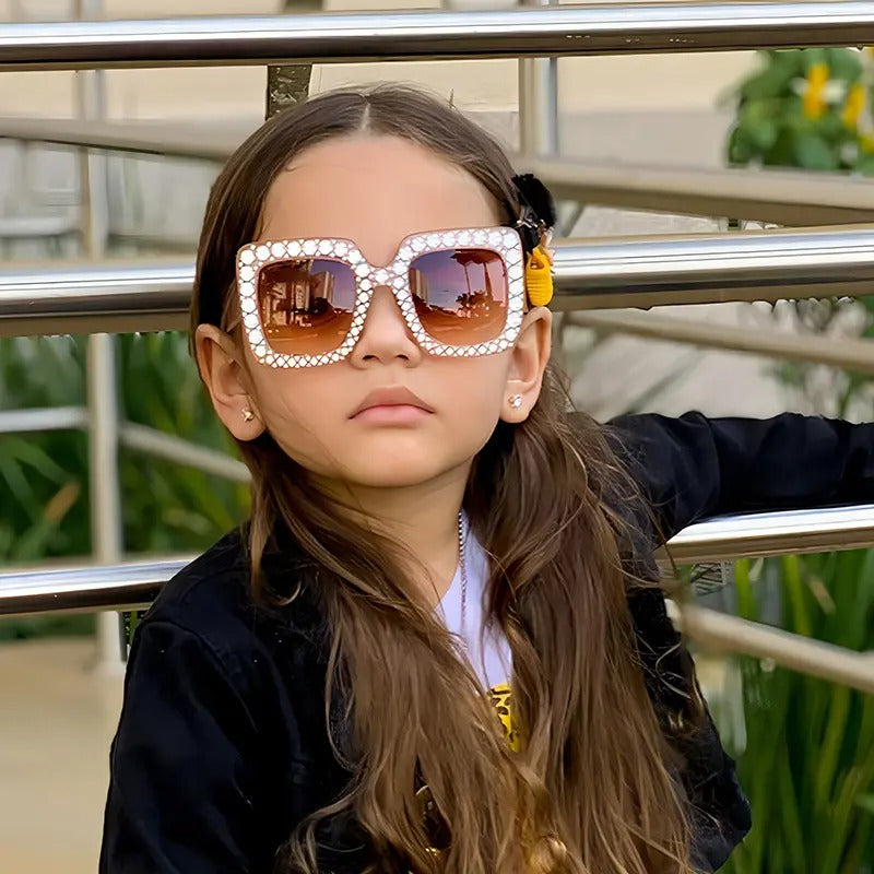 Girl wearing a Lullaby Sunglass